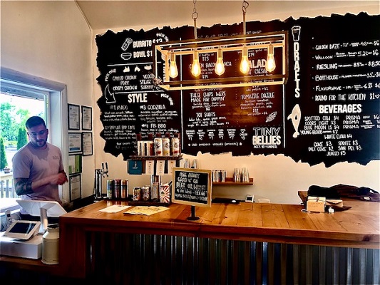Fat Belly's Menu is all displayed on the wall 